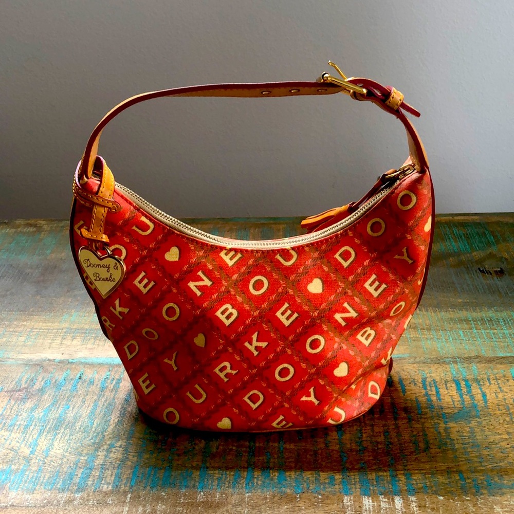 Dooney and Bourke purse. Orange and tan